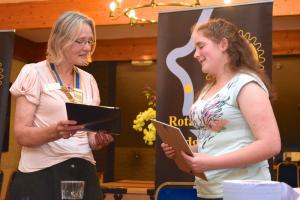 Fiona Dick receives her certificate from President Mary